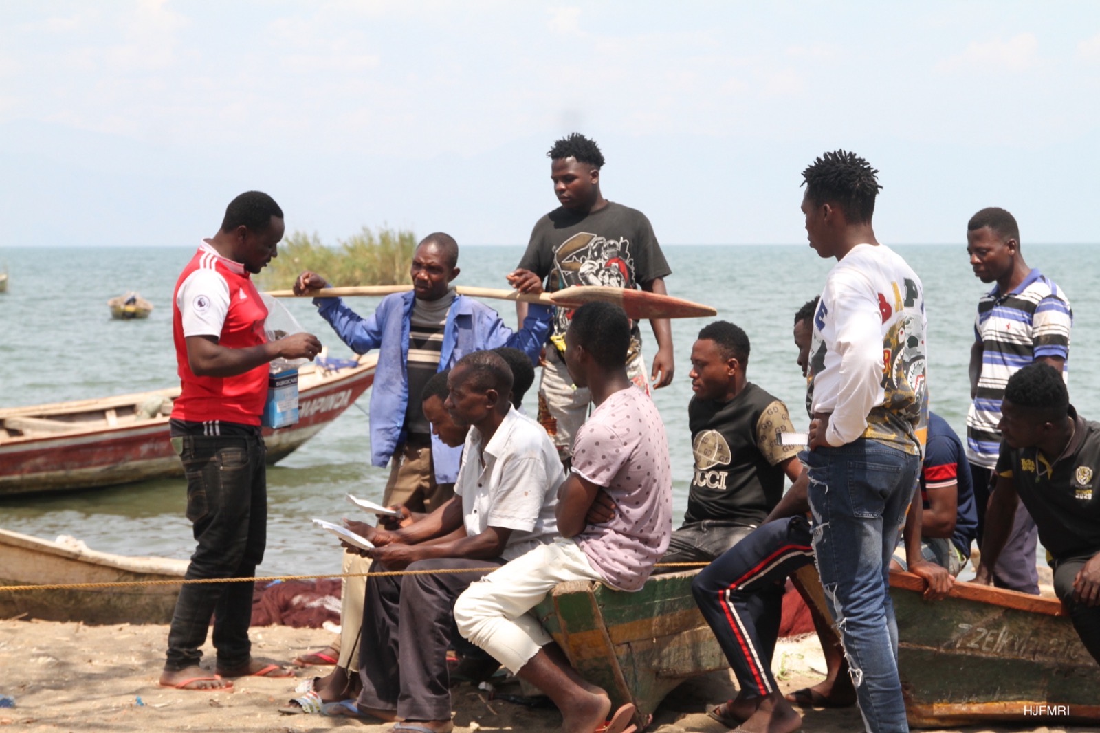 Community health worker showing treatment and prevention medicines